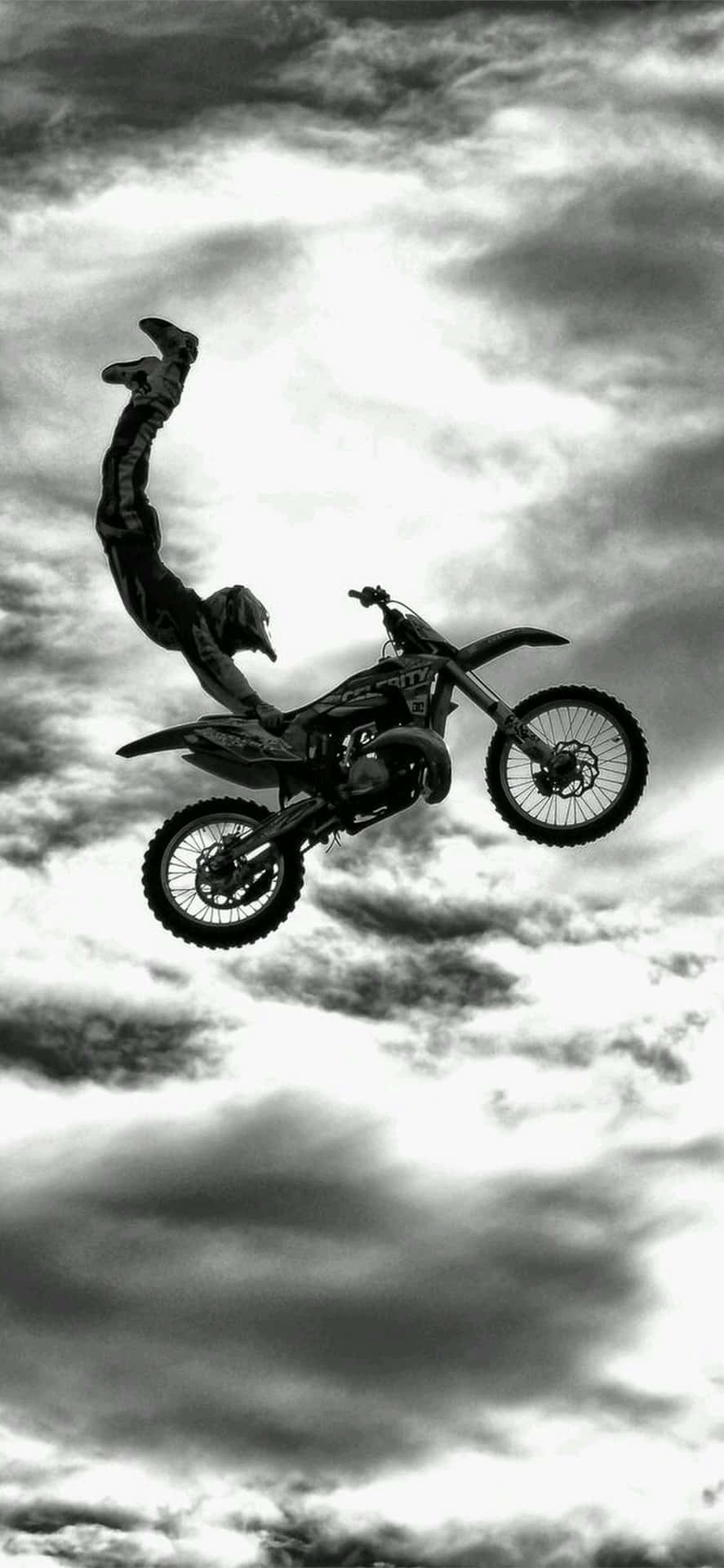 Man On Motorcycle In Sky [wallpaper]