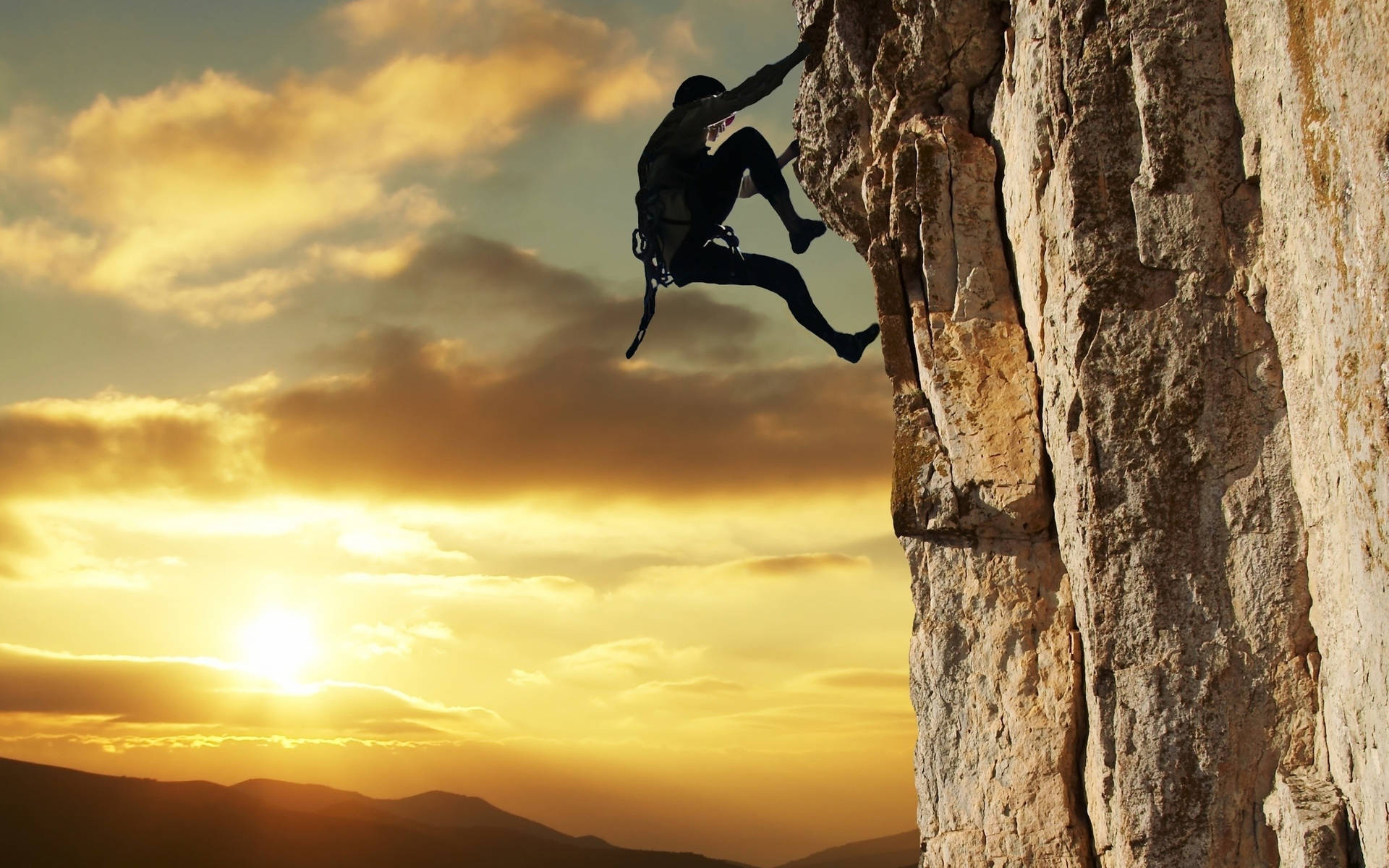 Man Rock Climbing During Sunset Background