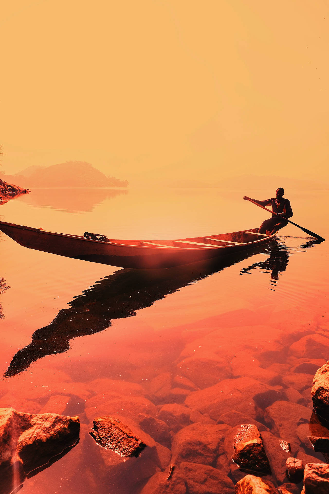 Man Rowing On A Boat Background