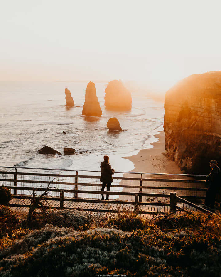 Man Silhouette In Twelve Apostles In Victoria Australia Background