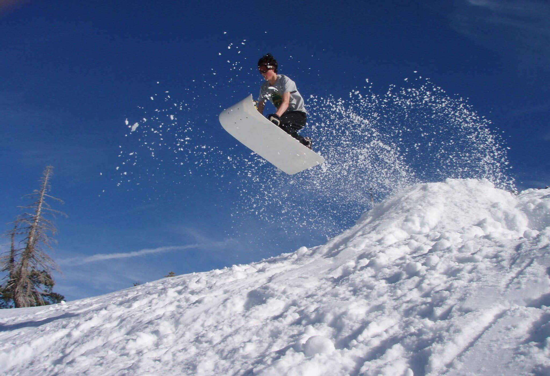 Man Sledding Jump