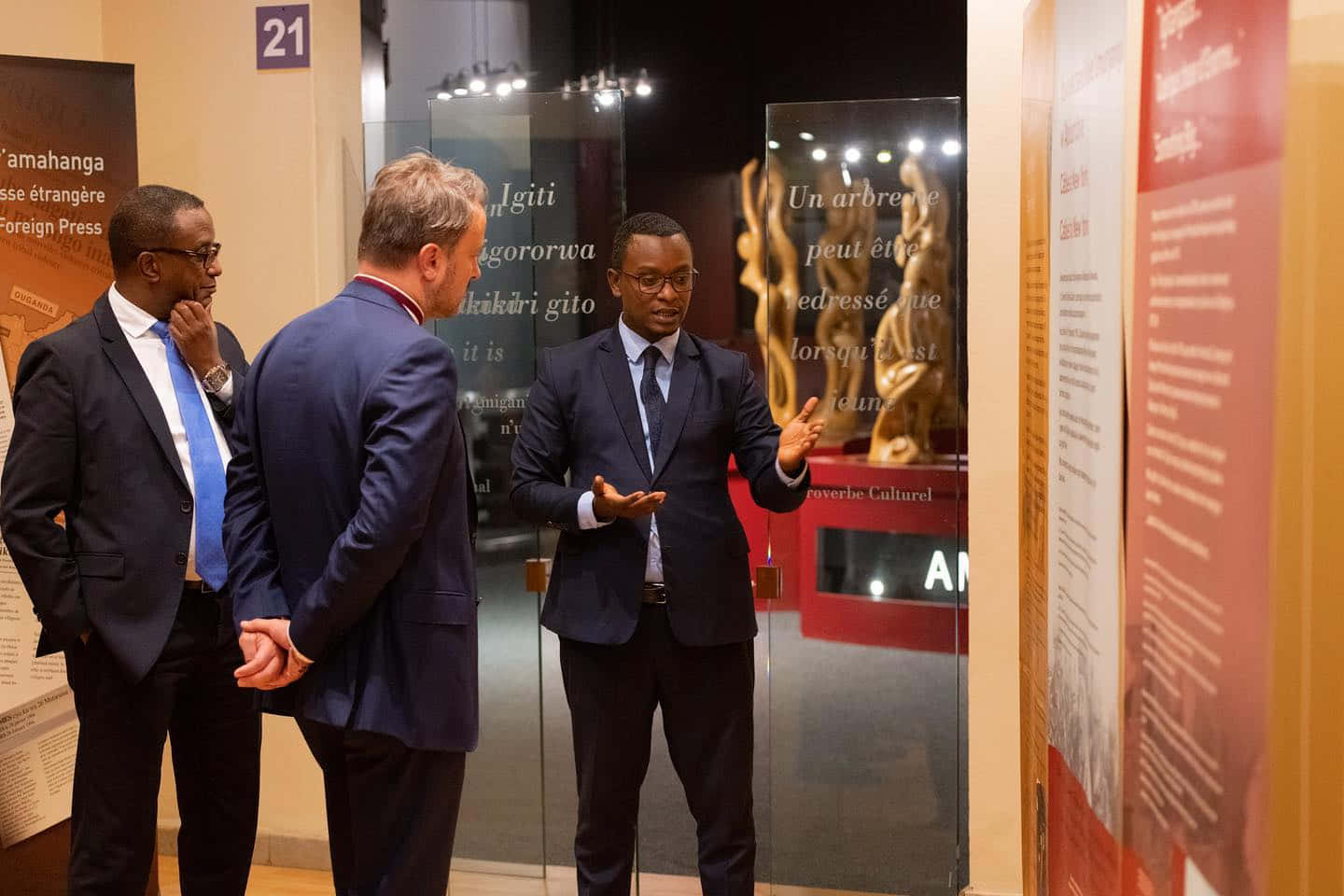 Man Speaking At Kigali Genocide Memorial Background