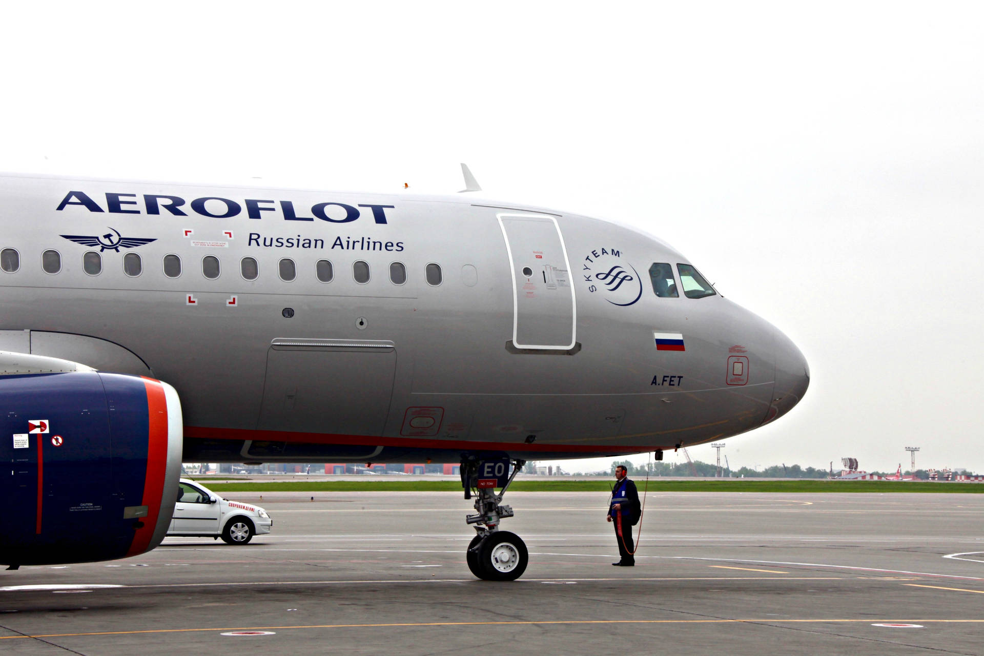 Man Standing Aeroflot Background