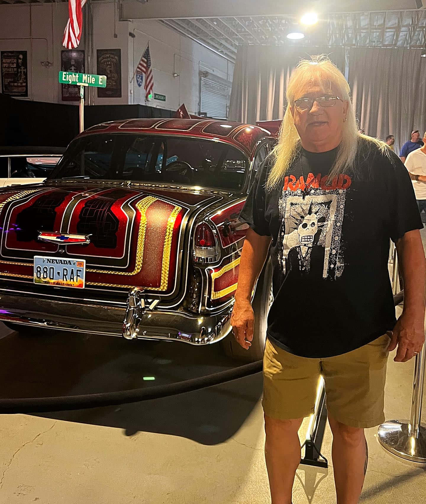 Man Standing Beside Classic Car Background