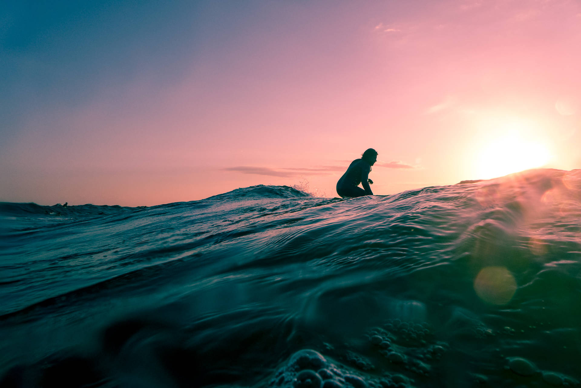 Man Surfing In Cool Water Background