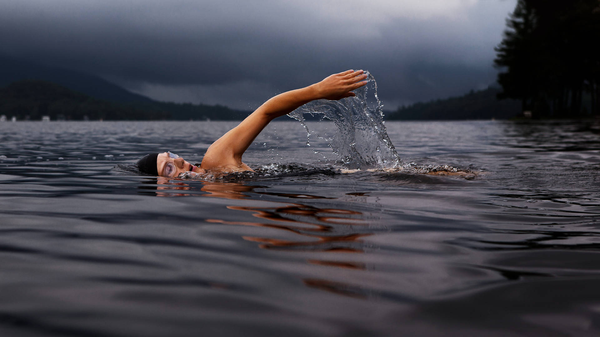 Man Swimming In Lake Background