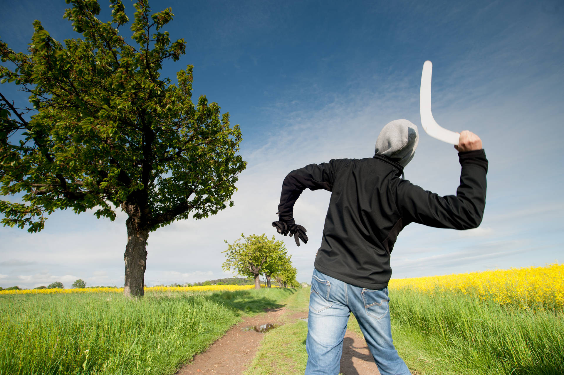 Man Throwing Boomerang Background