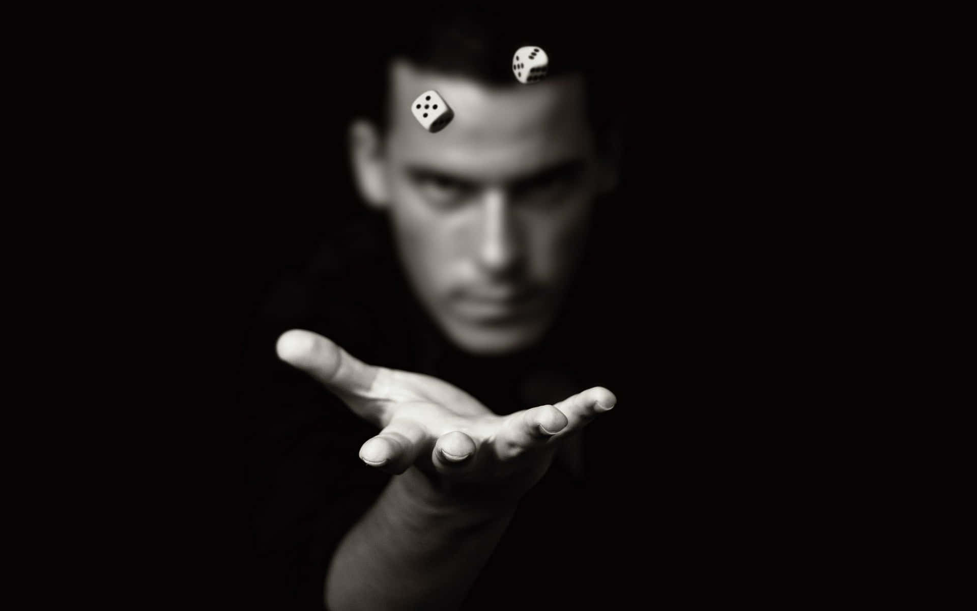 Man Tossing Dice Blackand White Background