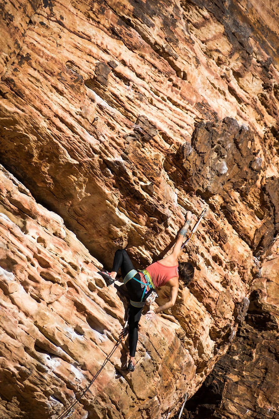 Man Toughly Rock Climbing