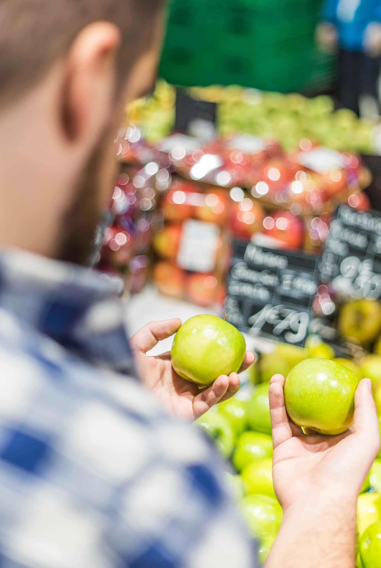 Man Using Qualitative Data In The Supermarket Background