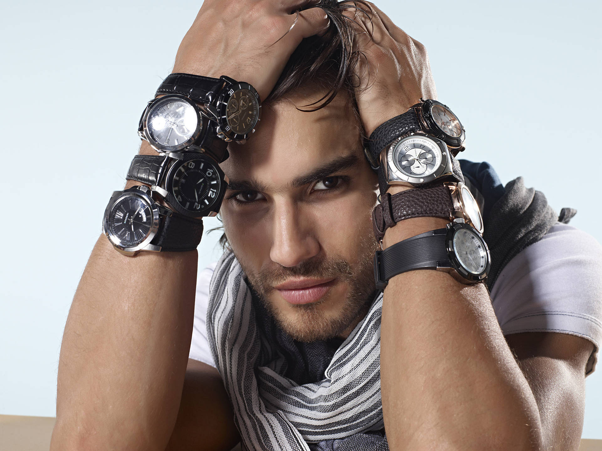 Man Wearing Lots Of Watches Background