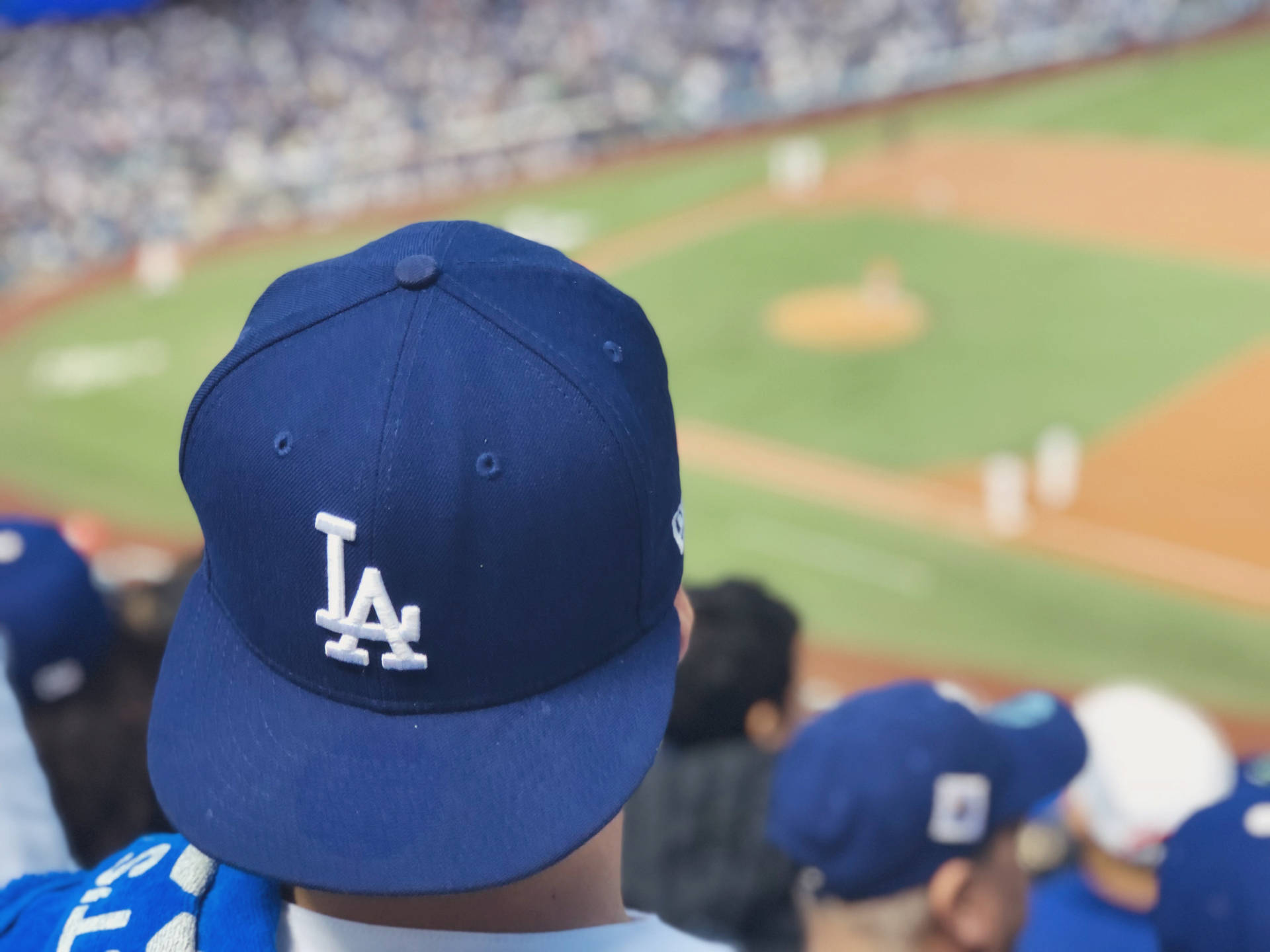 Man Wearing Mlb Dodgers Cap Background