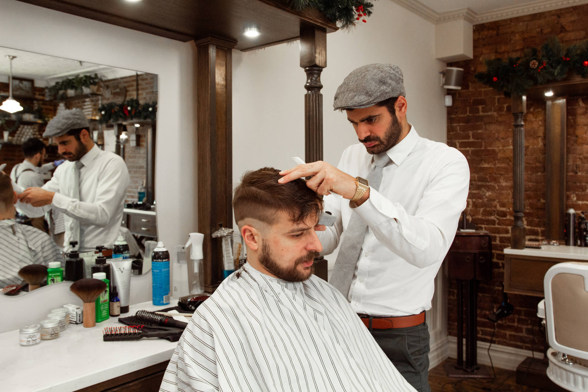 Man Wearing Newsboy Hat Performs Haircut Background