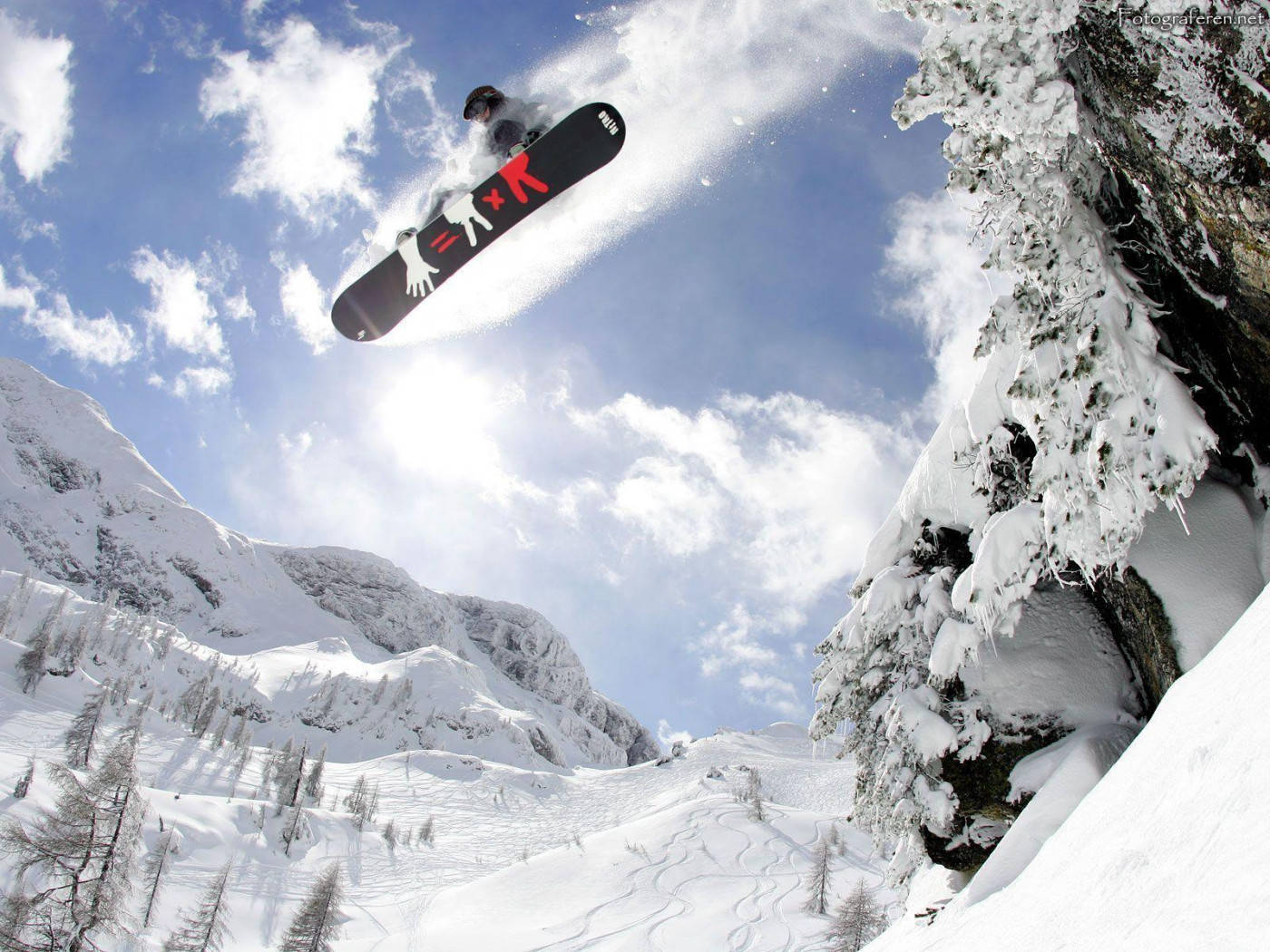 Man With A Snowboard Worm's Eye View Background