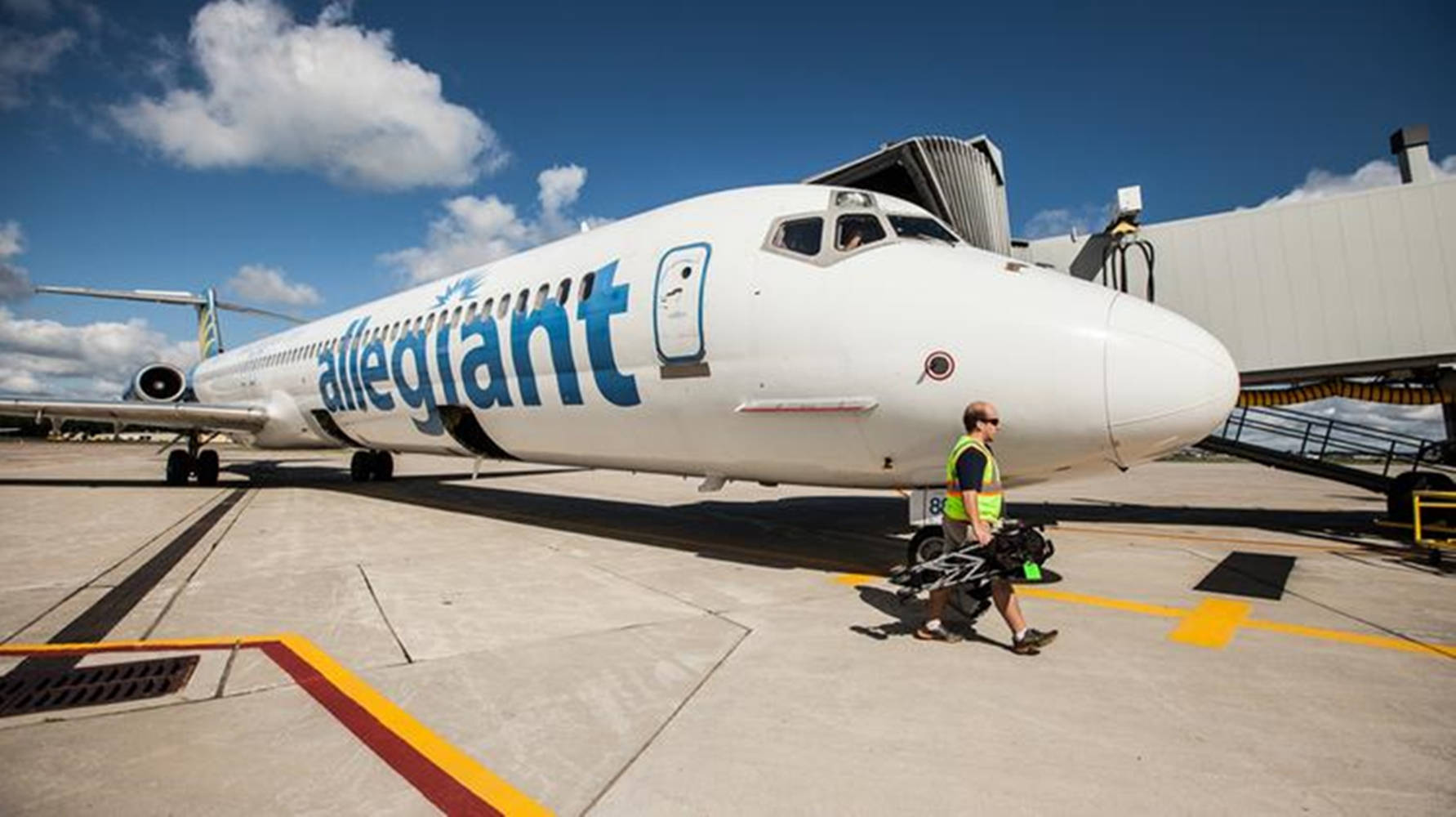 Man With A Trolley Allegiant Air Background