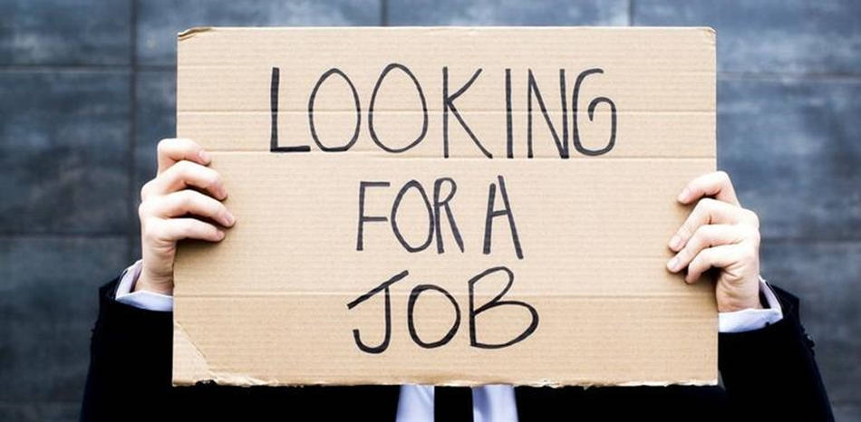 Man With An Unemployment Signage