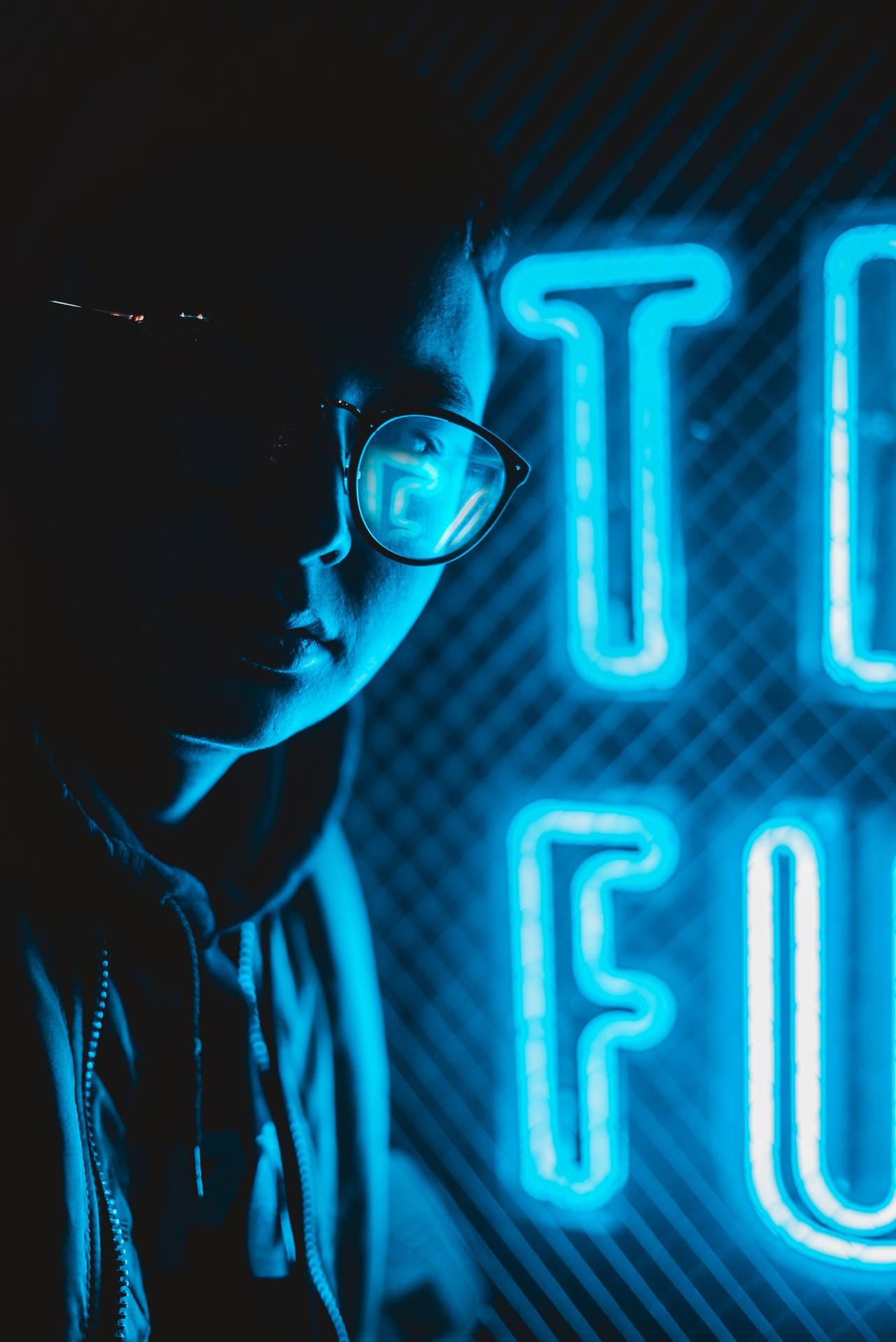 Man With Eyeglasses In Neon Blue Iphone Background