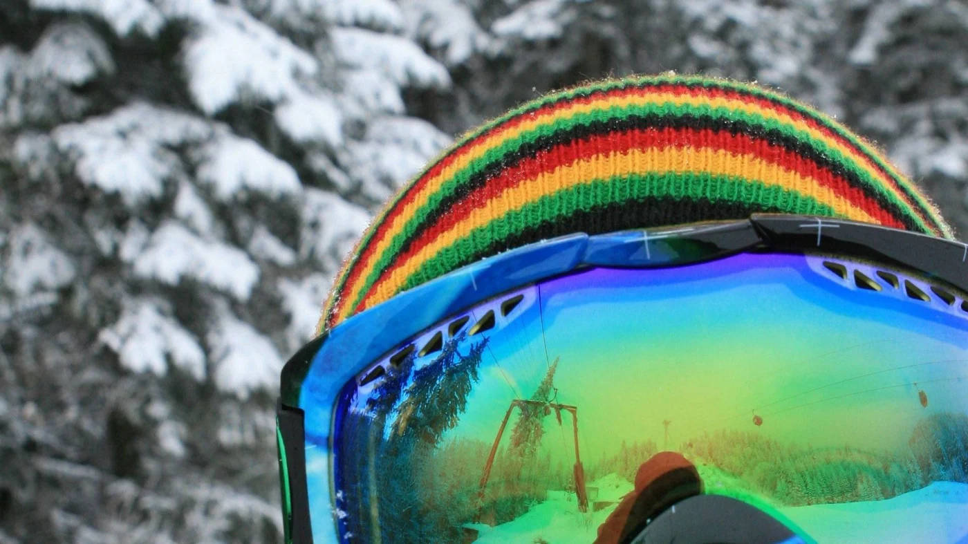 Man With Snowboard And Goggles