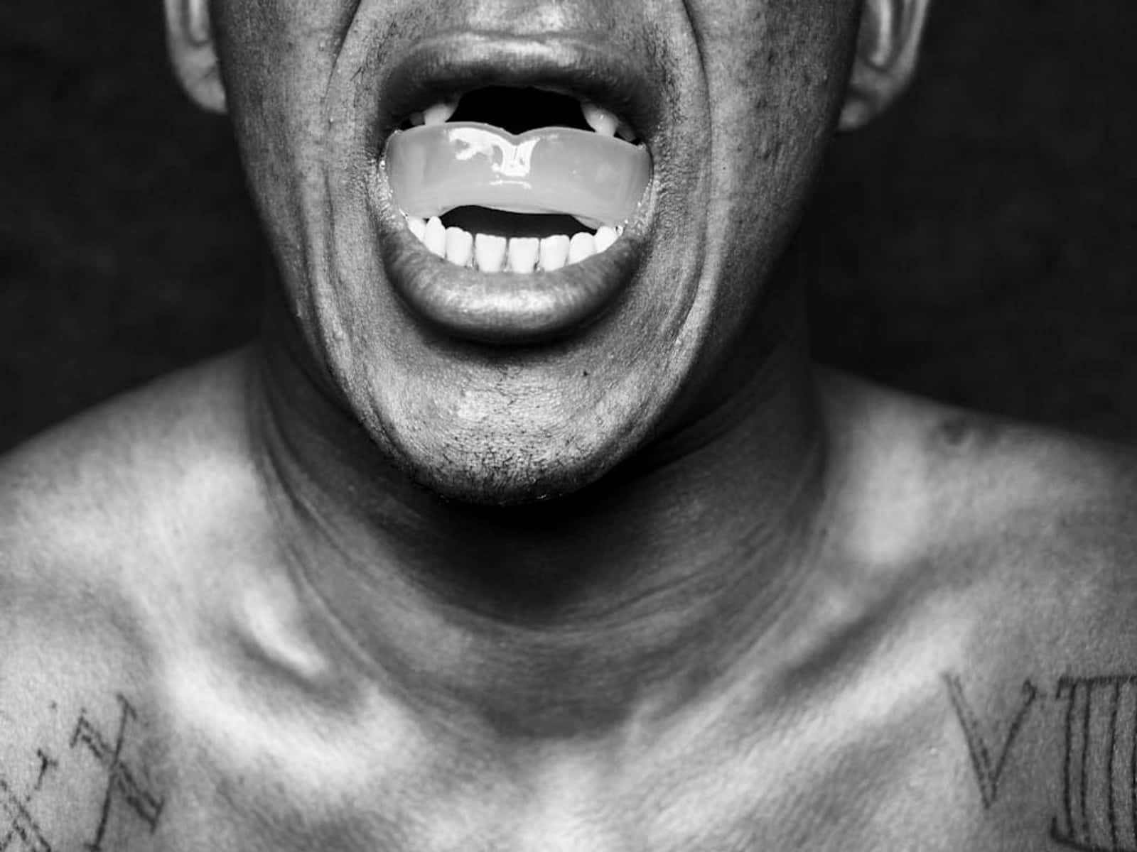 Man With Unorthodox Teeth Background