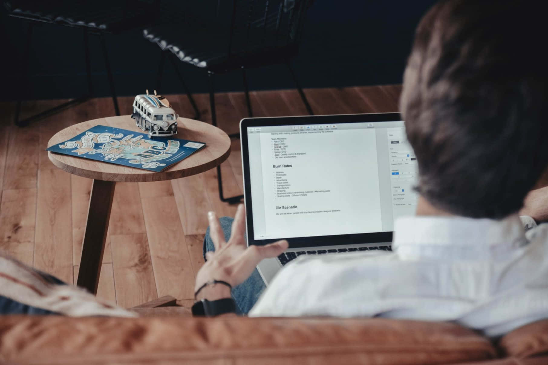 Man Workingon Laptop From Home Background