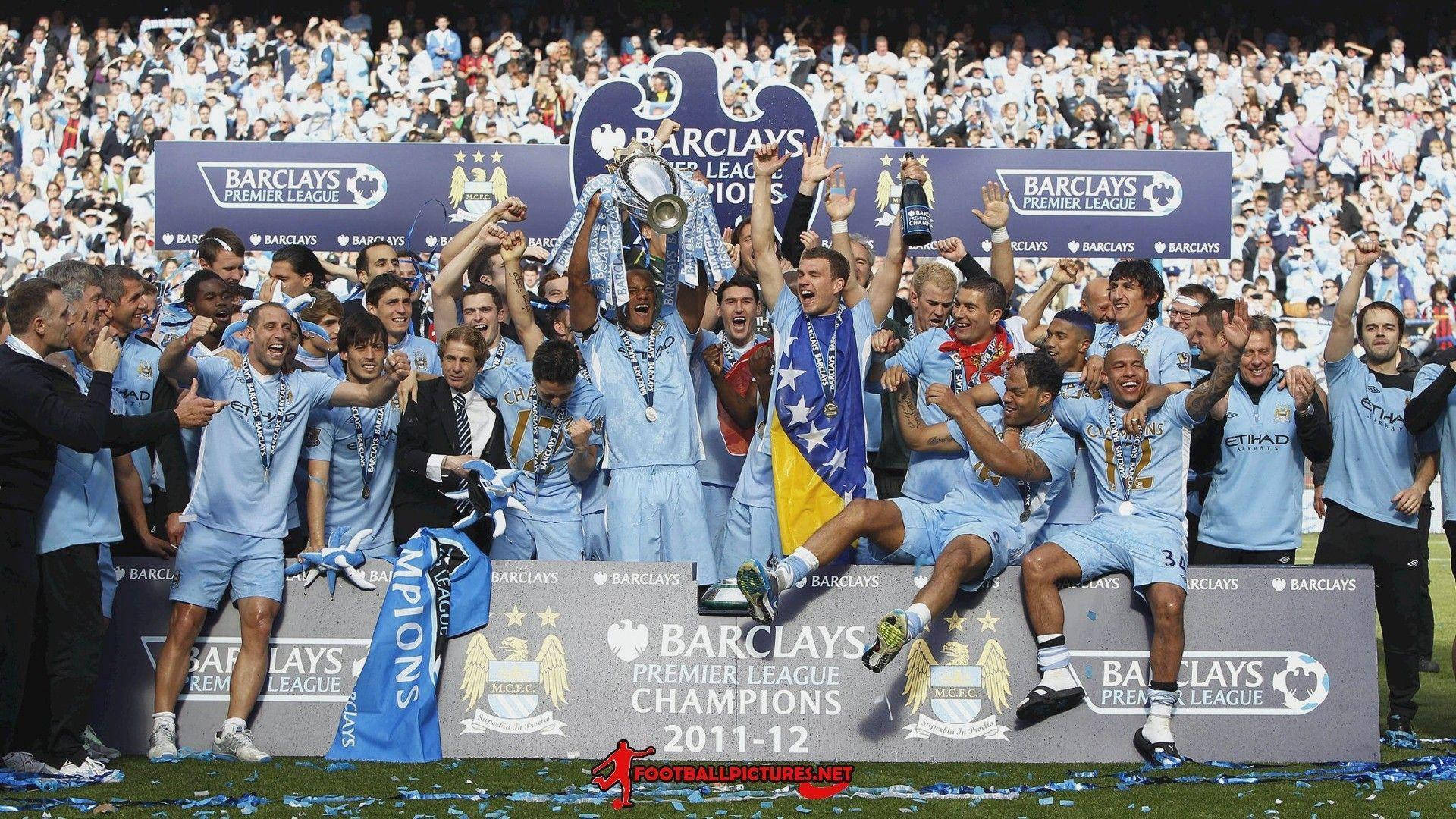 Manchester City Fc Cheering After A Match Background