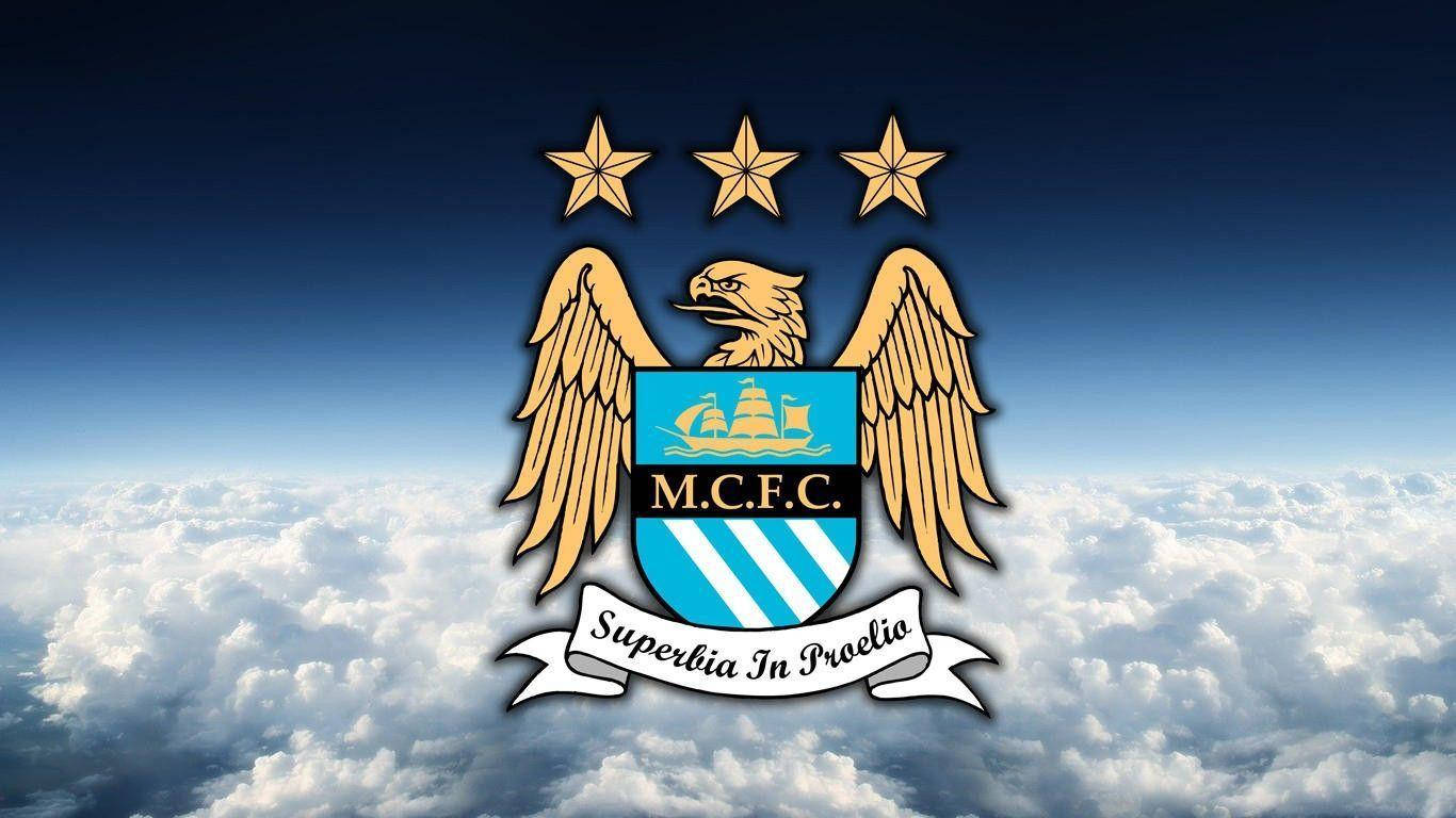 Manchester City Fc Logo Over The Cloudy Sky