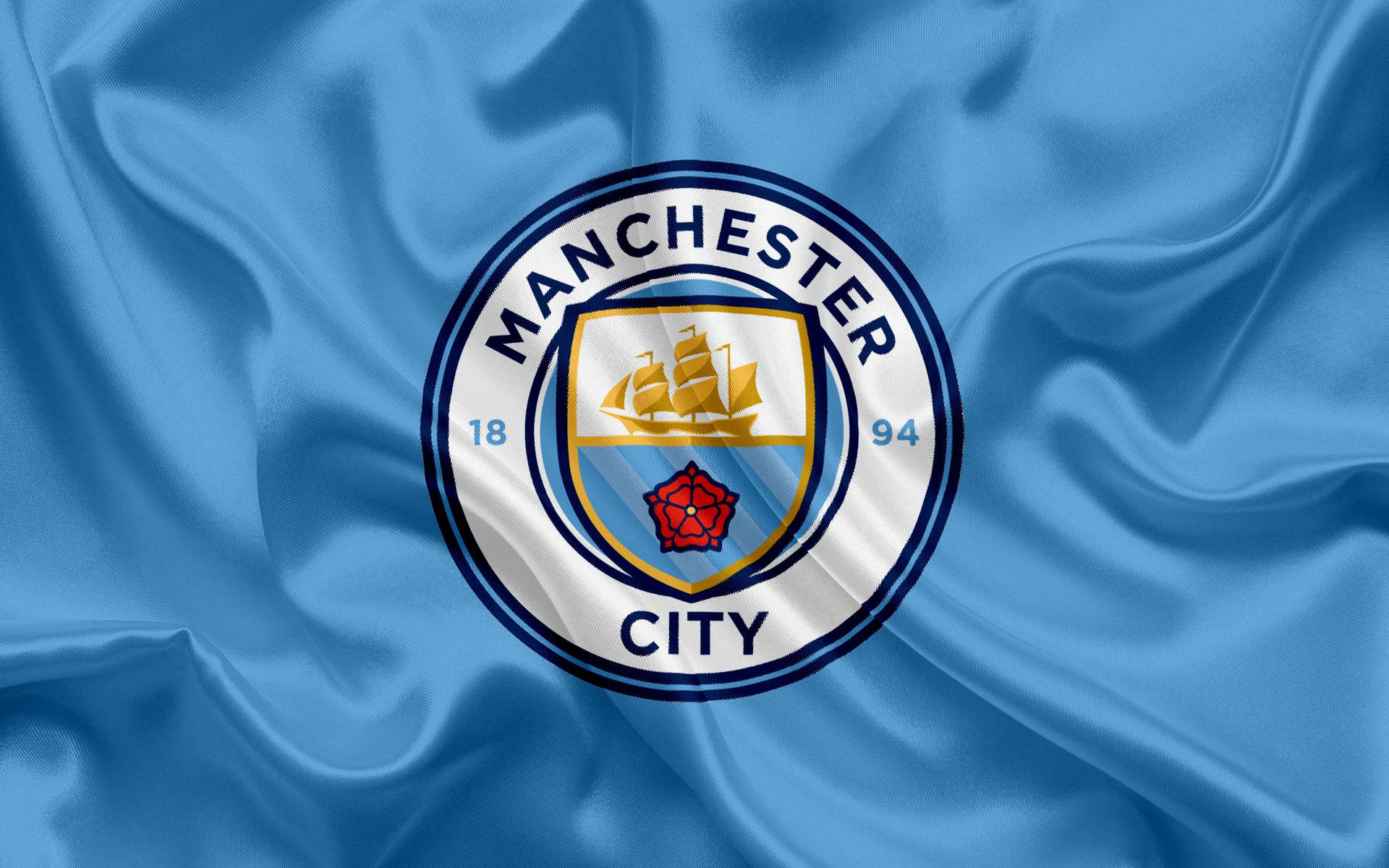 Manchester City's Official Logo And Flag Background