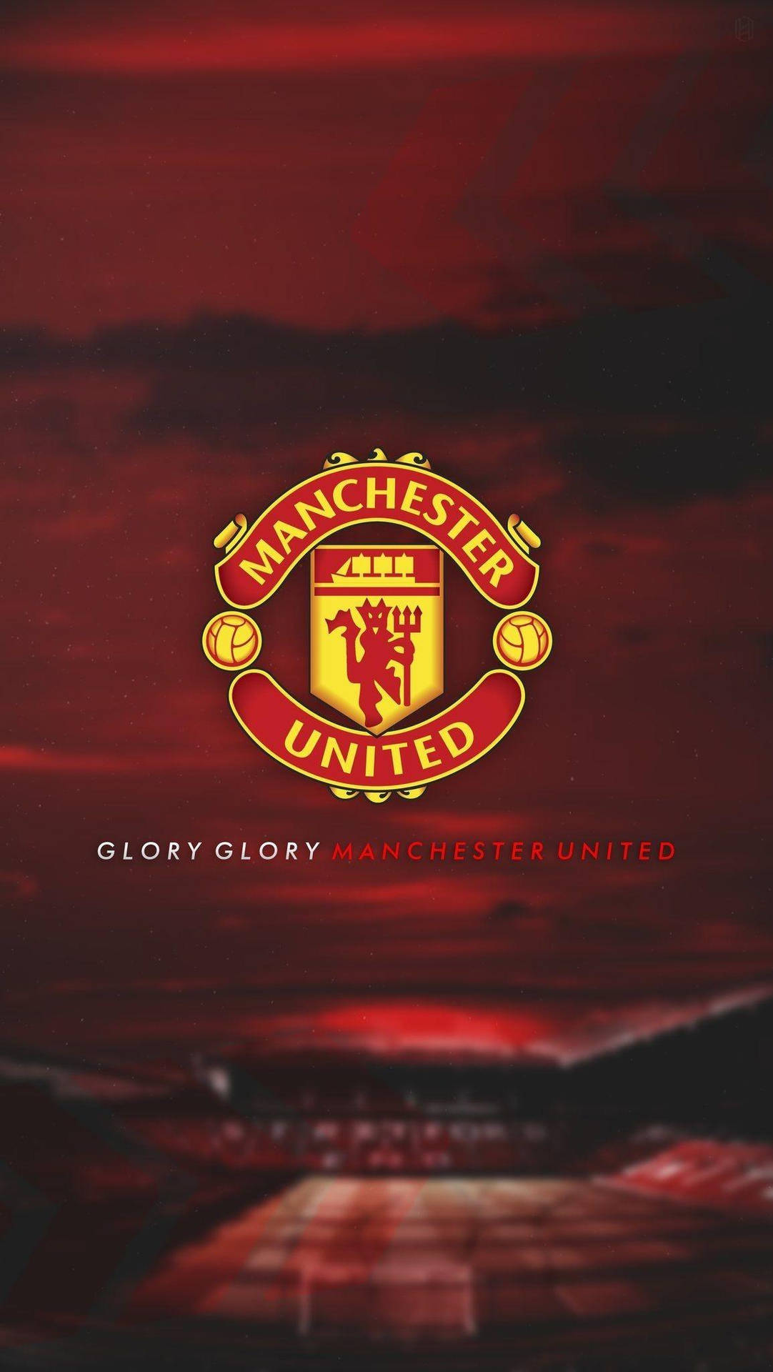 Manchester United Emblem With A Fiery Background Background