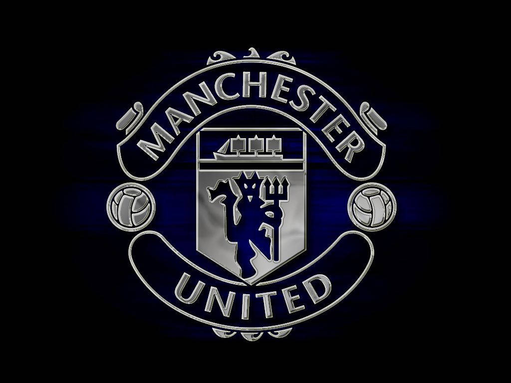 Manchester United Football Club Emblem In Red And White. Background