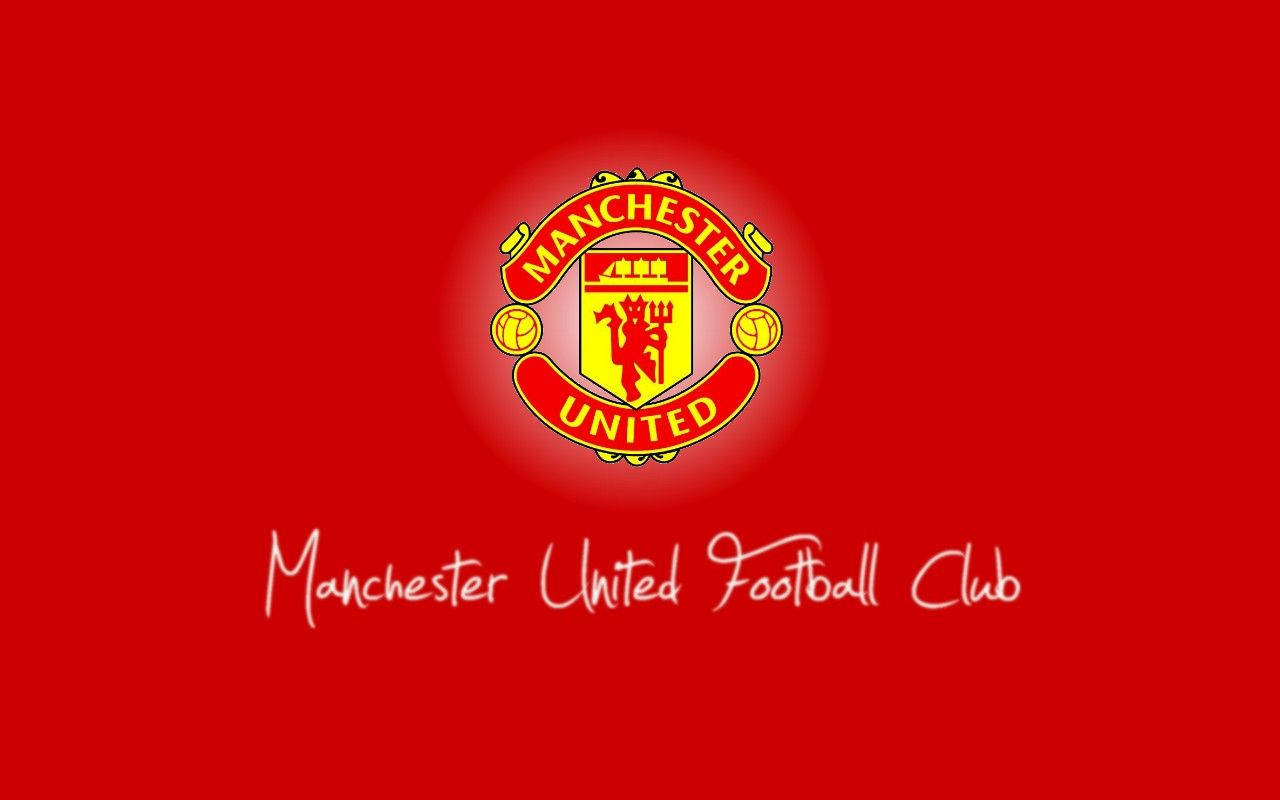 Manchester United Iconic Team Crest Passionately Illustrated On A Vibrant Red Background.