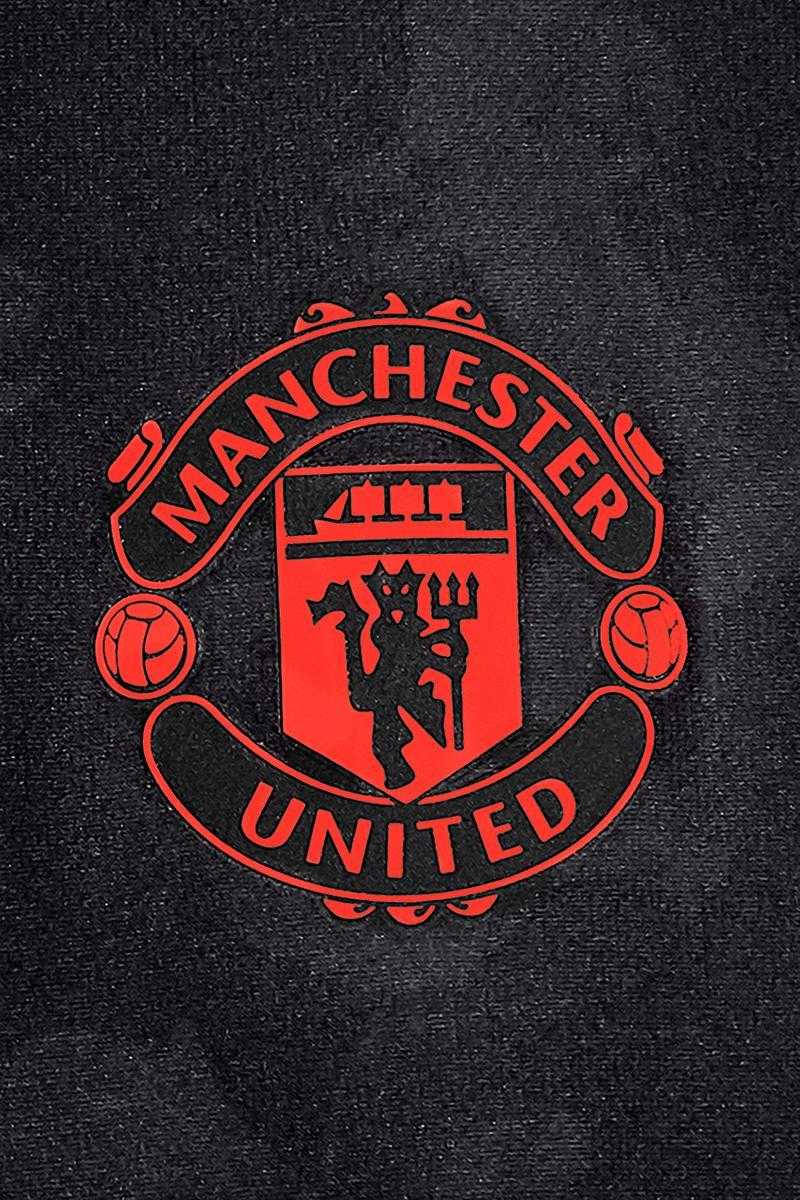 Manchester United Logo With Orange Outline Background