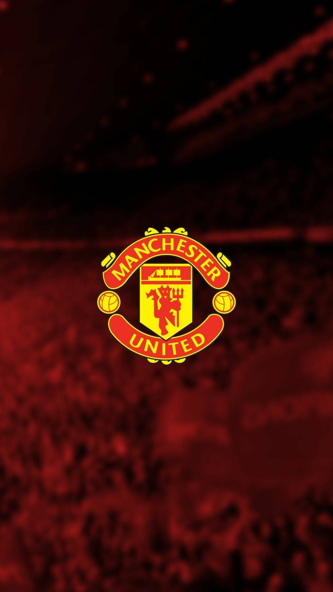 Manchester United Logo With Stadium Background