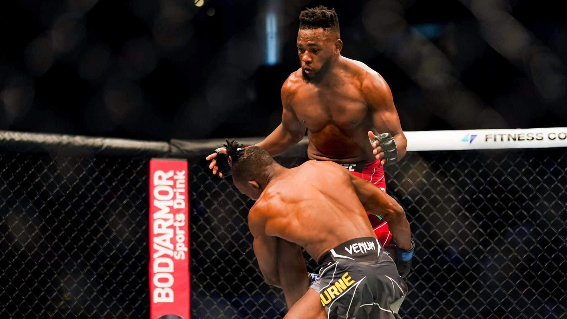 Manel Kape Tackled By Opponent