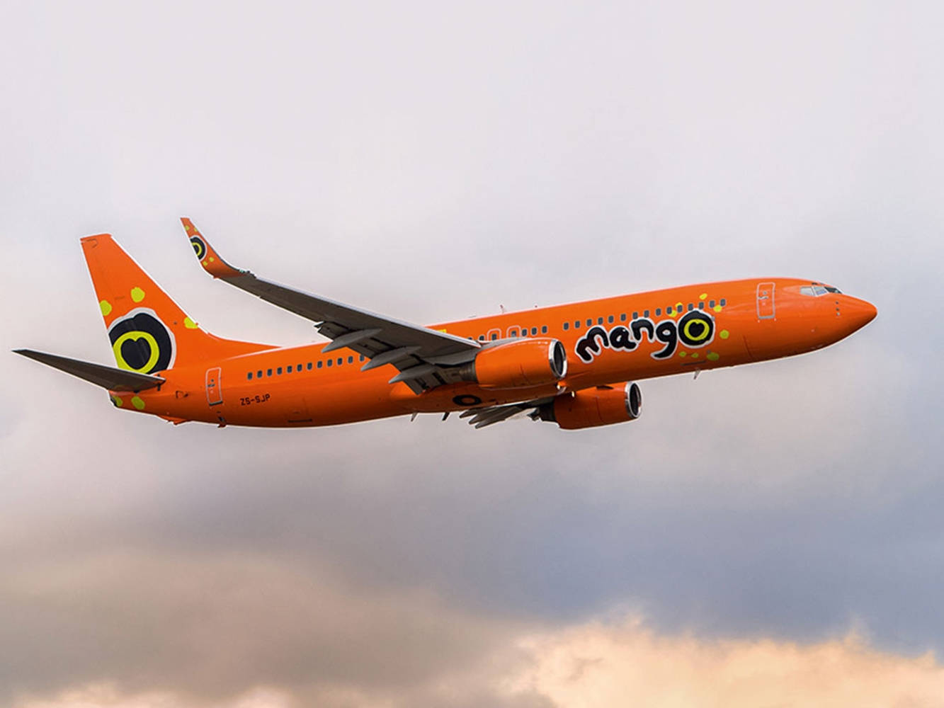 Mango Airlines Airplane Cloudy Sky