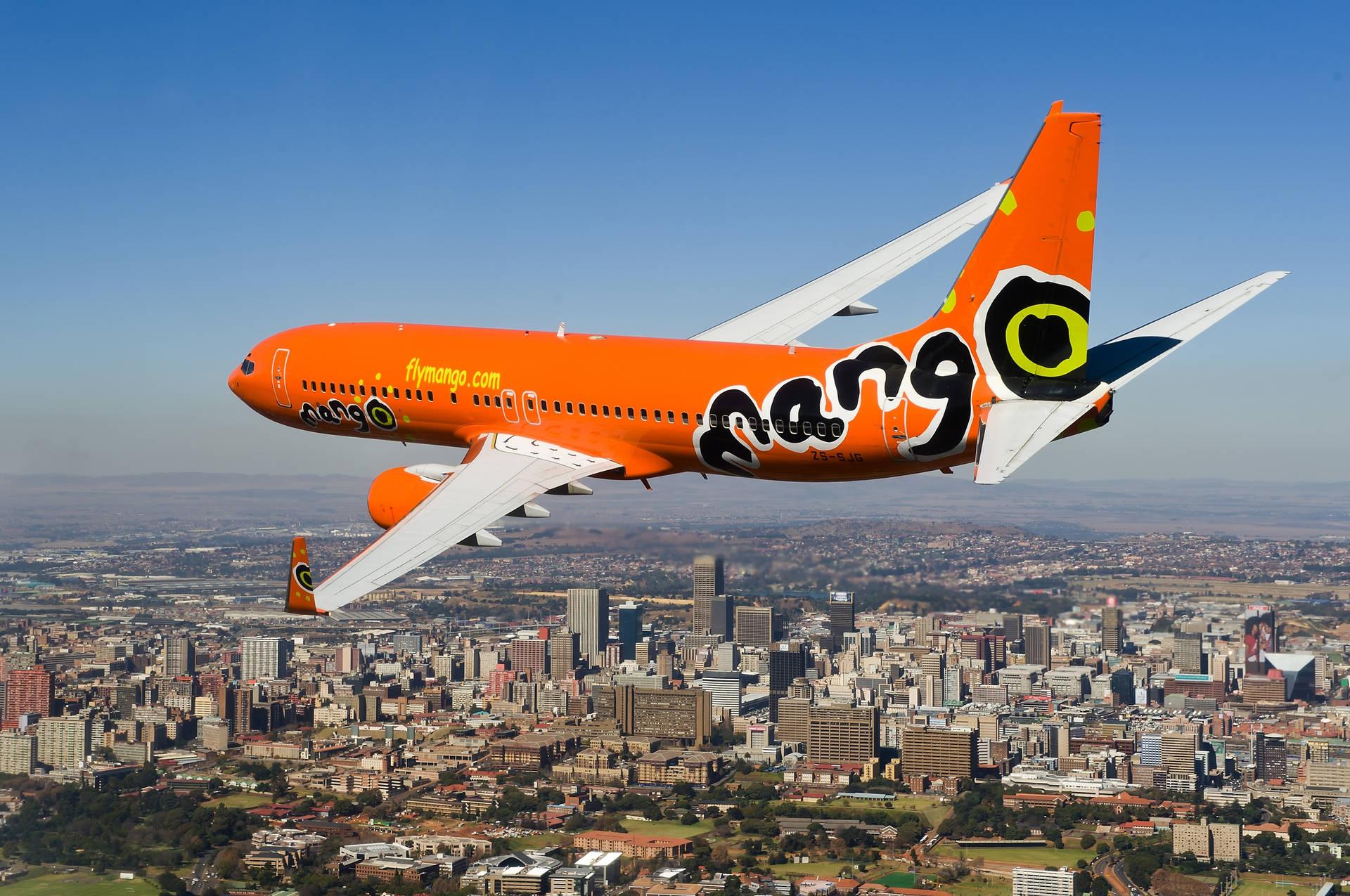 Mango Airlines Orange Airplane Background