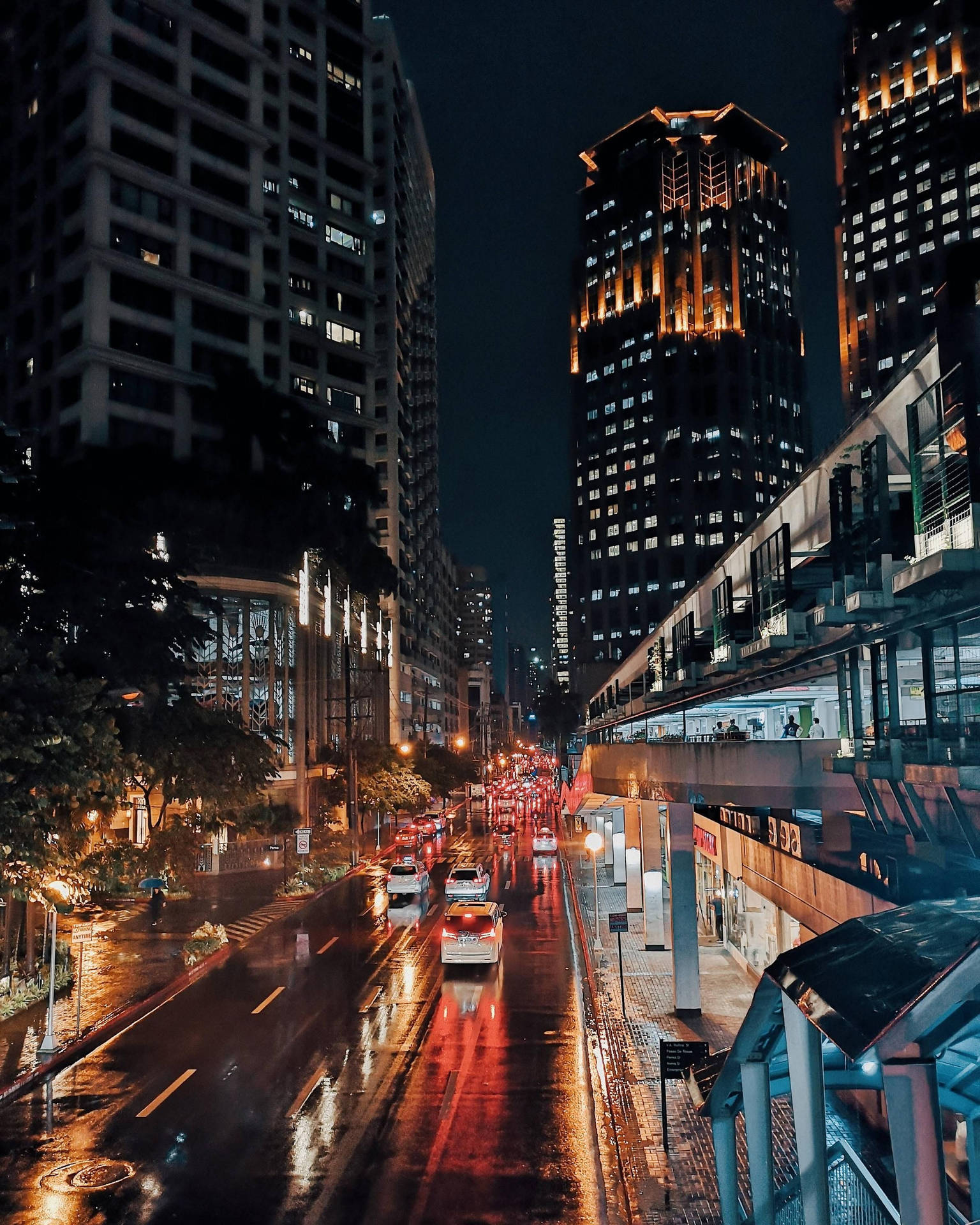 Manila's Busy Night Lights Background
