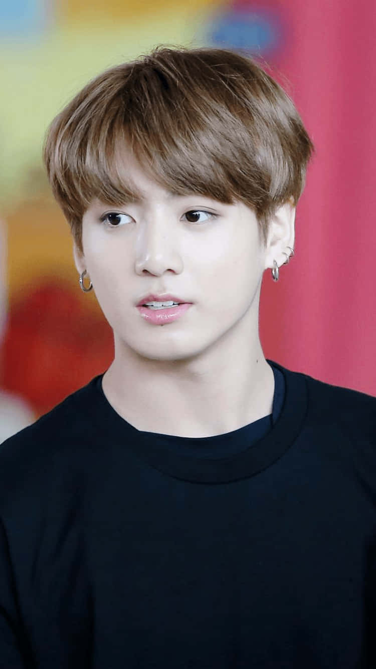 Manin Black Shirt Gazing Sideways Background
