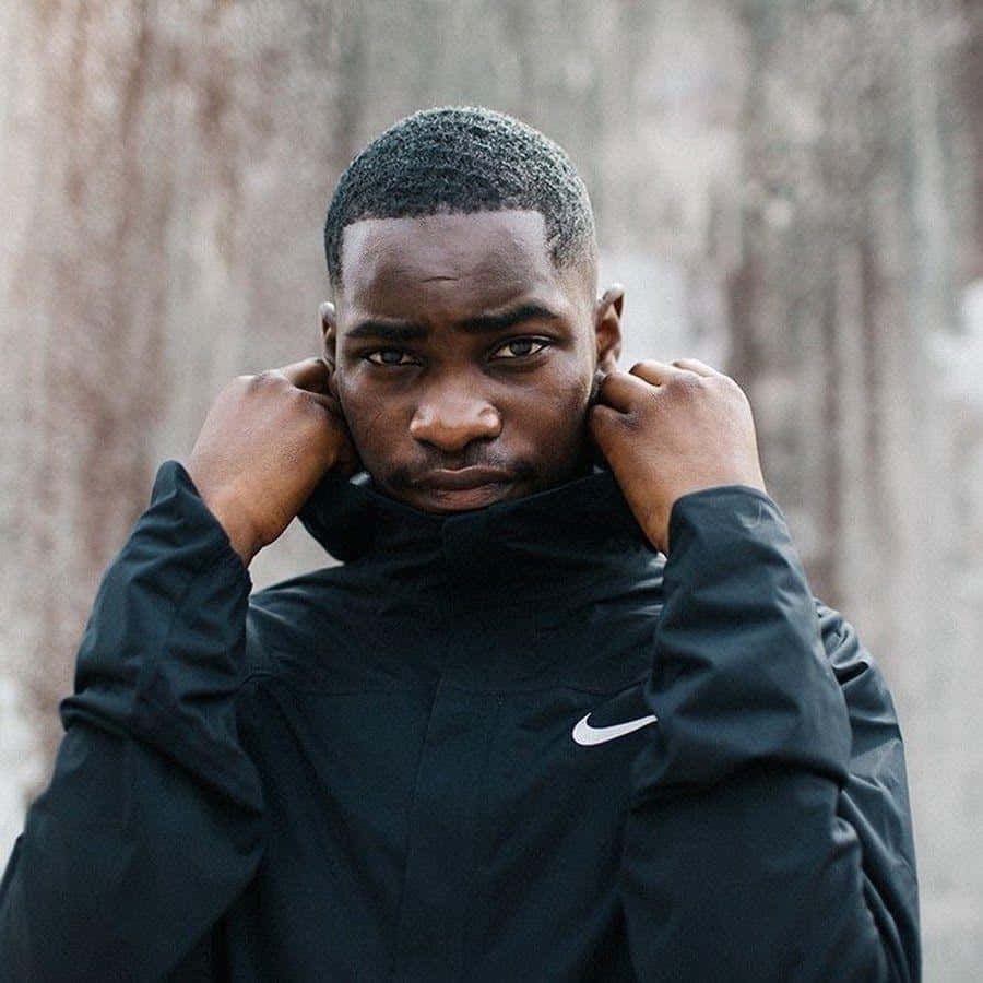 Manin Nike Jacket Outdoors Background
