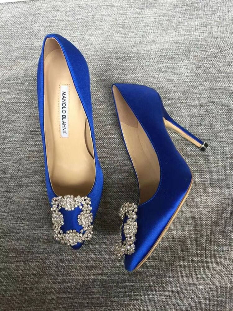 Manolo Blahnik Royal Blue Stilettos Background