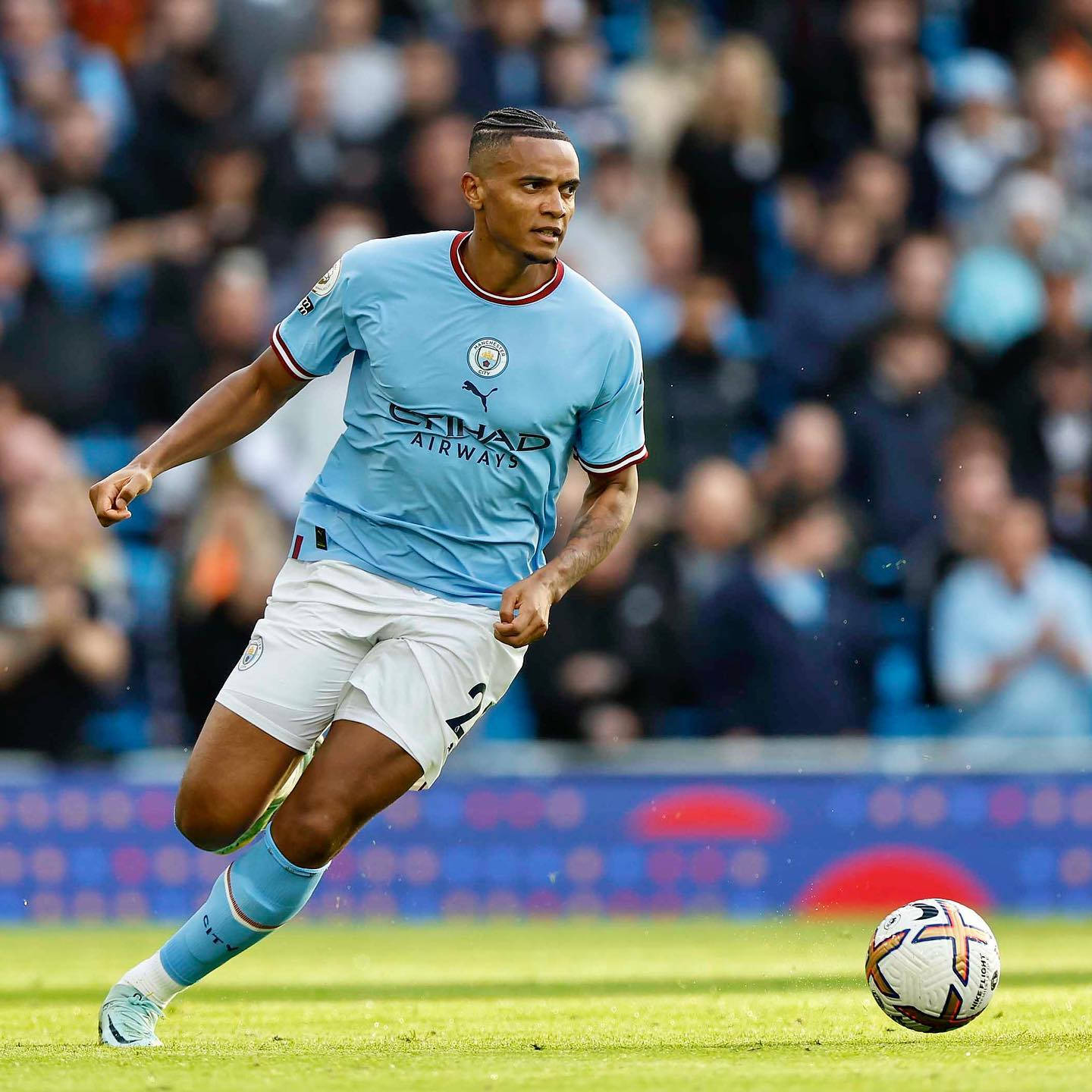 Manuel Akanji Chasing The Ball Background