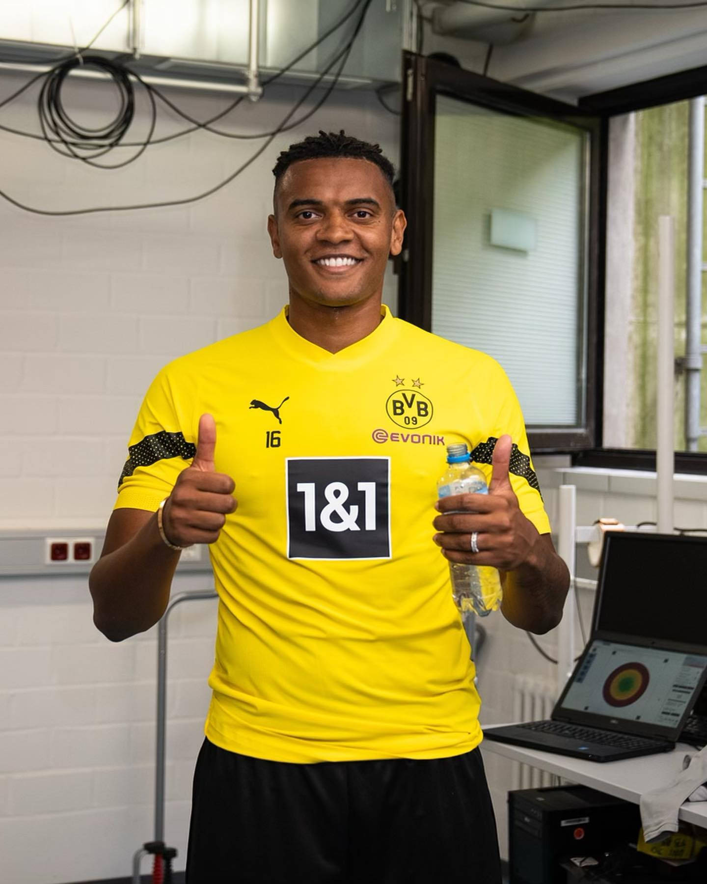 Manuel Akanji Giving Two Thumbs Up Background