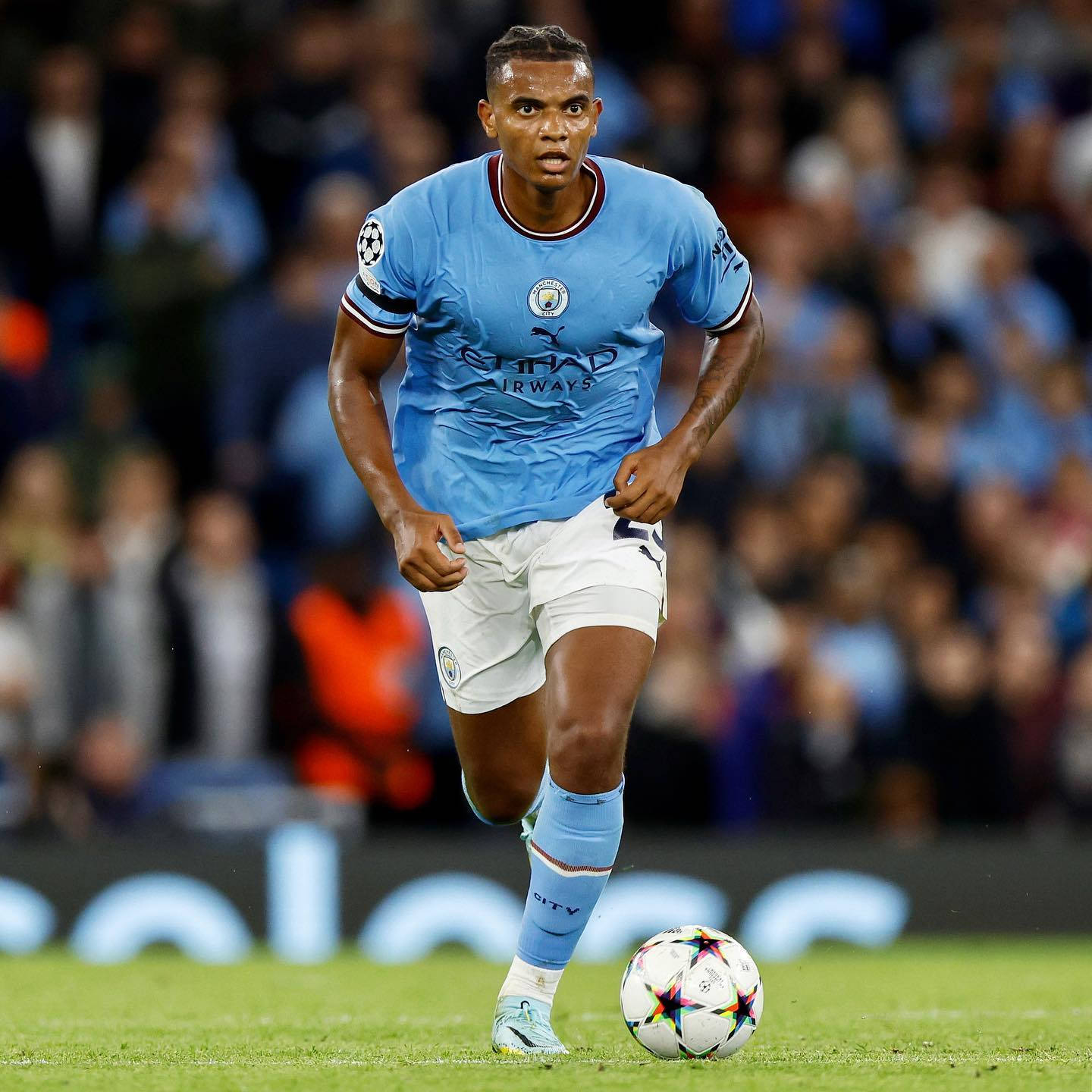 Manuel Akanji In Action During A Match Background