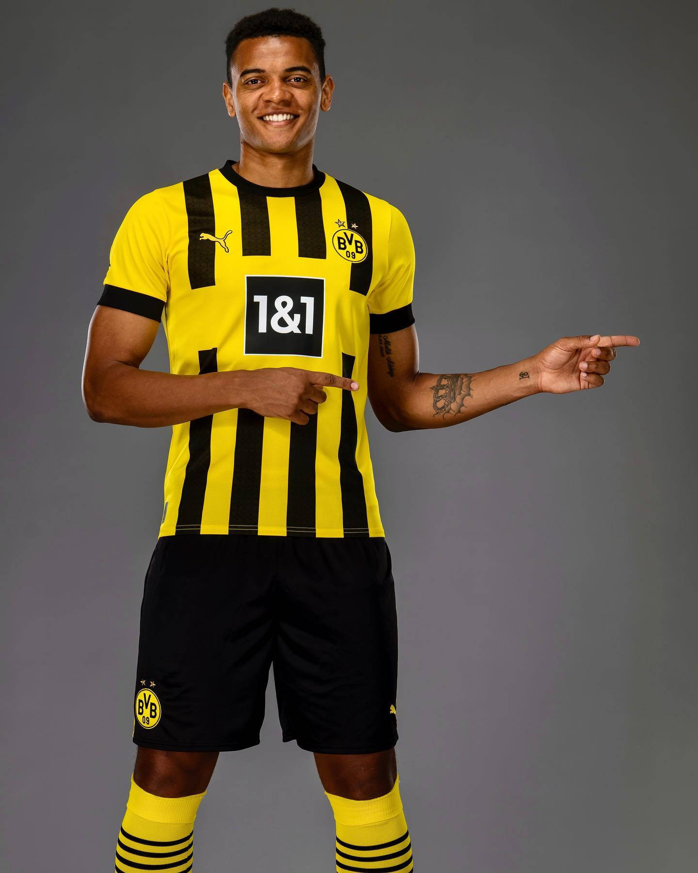 Manuel Akanji Pointing To The Right Background