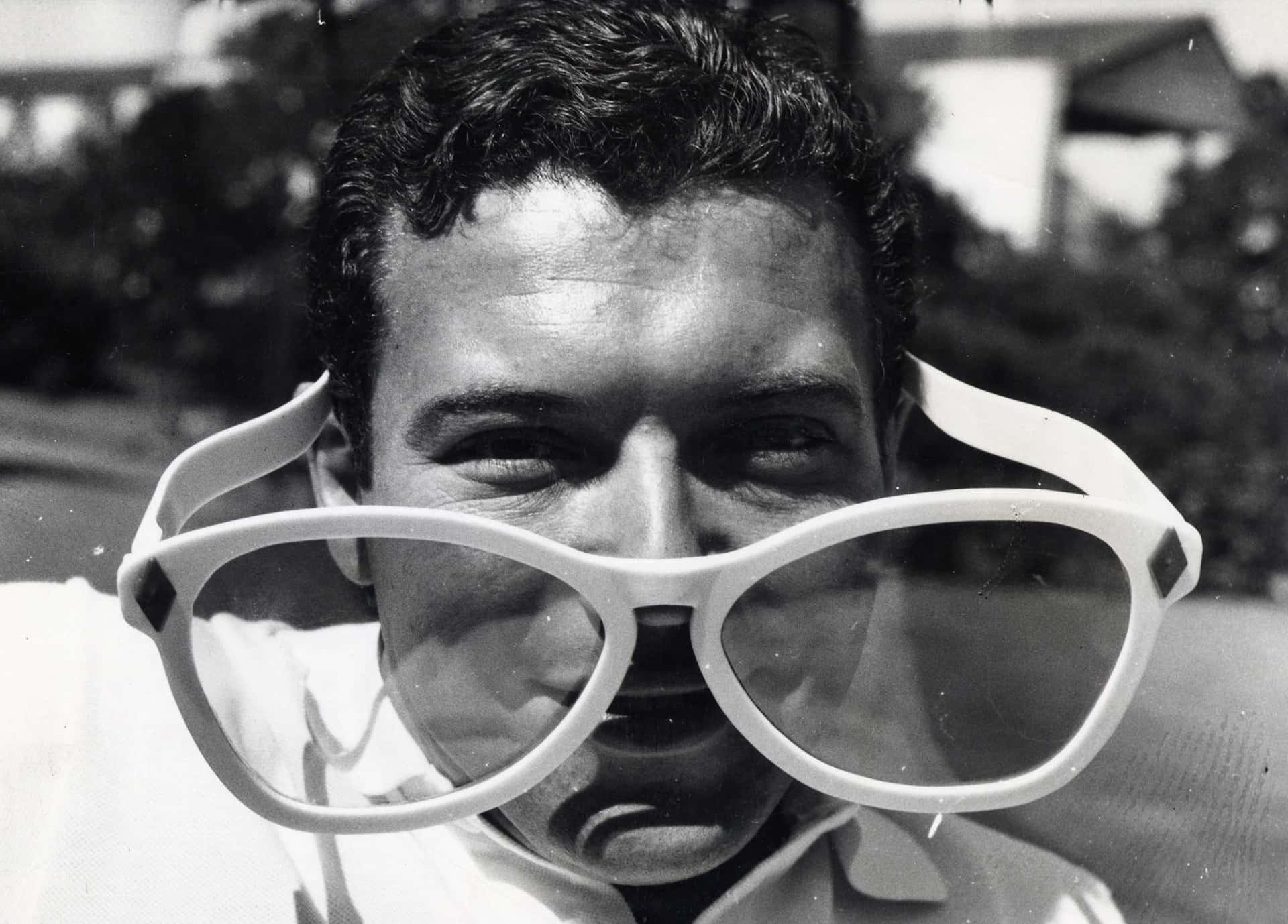 Manwith Oversized Sunglasses Background