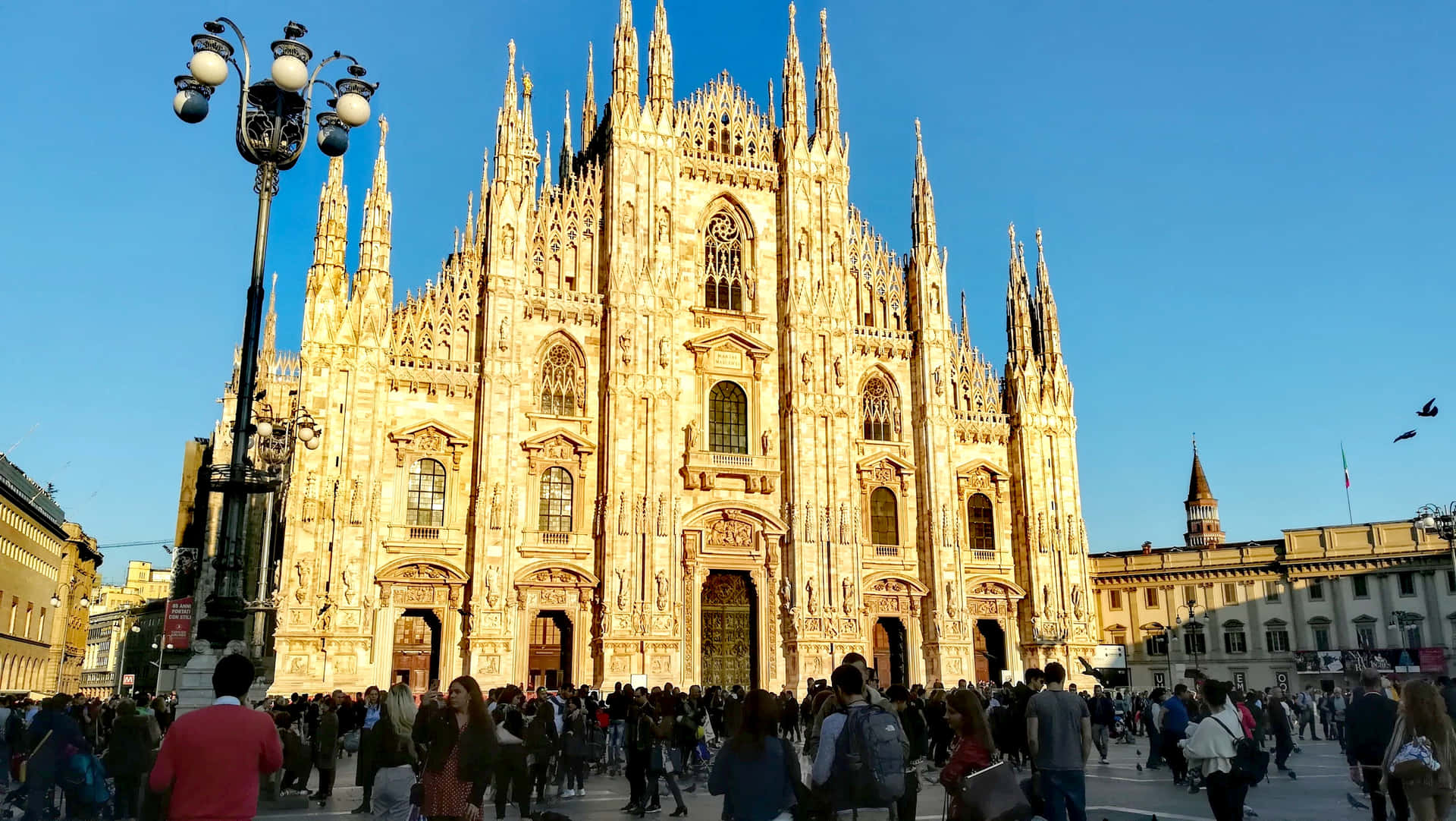Many People On Milan Cathedral On A Sunny Day