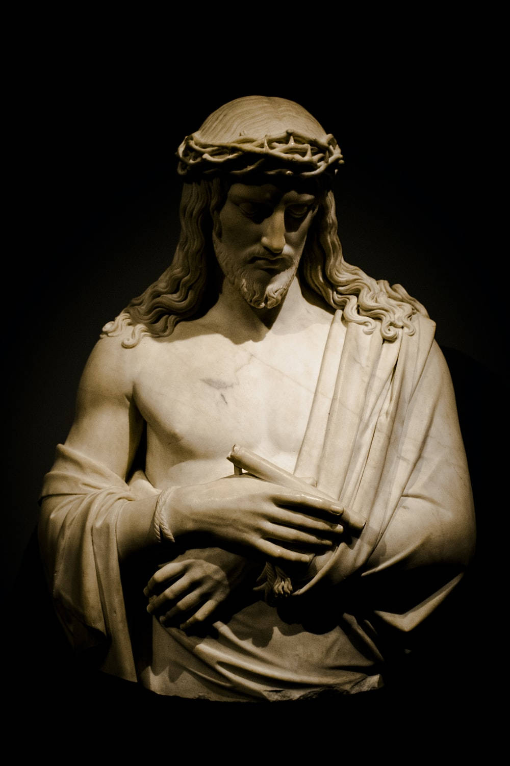Marble Statue Of Christ Jesus Phone Background