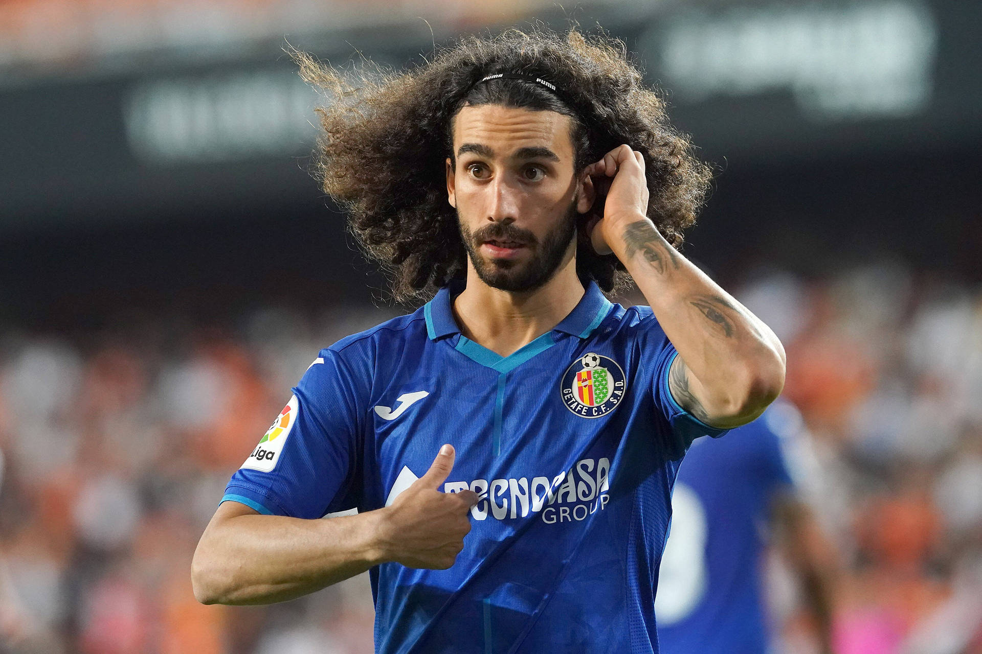 Marc Cucurella Hair Tuck Background