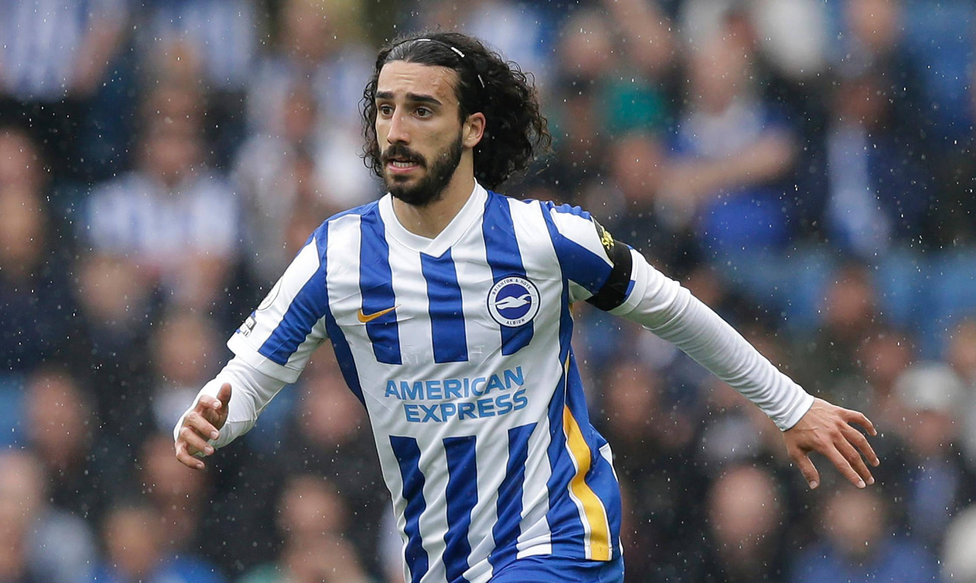 Marc Cucurella In Action On The Soccer Field Background