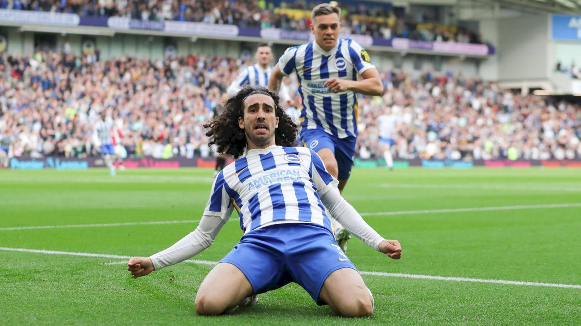 Marc Cucurella Slide Kneel Background