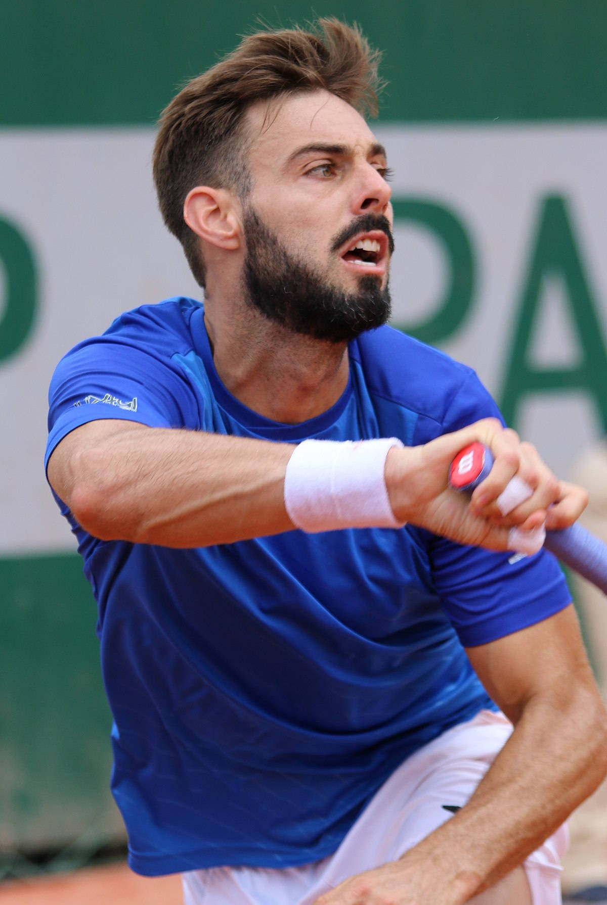 Marcel Granollers In Blue Shirt Background